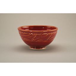 Chun Plum Amaco Potter's Choice Glaze applied to a bowl.