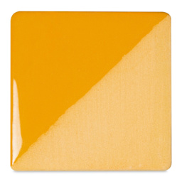 Speedball Ceramic Underglaze - Peach, Opaque, fired on white clay bisque tiles, half covered in Speedball Clear Glaze, fired to cone 05