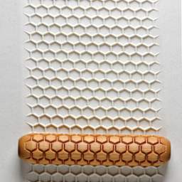 MKM Pottery Tools Big Hand Roller - Honeycomb applied to clay