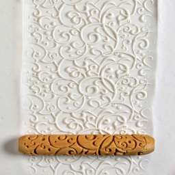 MKM Pottery Tools Hand Roller - Curlicue applied to clay