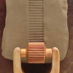 MKM Pottery Tools Medium Handle Roller - Medium, Vertical Lines applied to clay