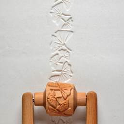 MKM Pottery Tools Medium Handle Roller - Ginkgo Leaves applied to clay