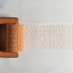MKM Pottery Tools Large Handle Roller - Layered Lines applied to clay