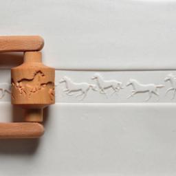 MKM Pottery Tools Medium Handle Roller - Running Horses applied to clay