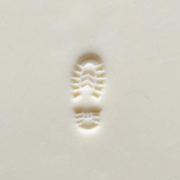 MKM Pottery Tools Small Round Stamp - SCS-216, Left Boot Print applied to clay