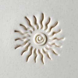 MKM Pottery Tools Large Round Stamp - SCL-004, Spiral Sun applied to clay
