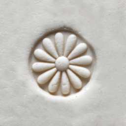 MKM Pottery Tools Small Round Stamp - SCS-003, Debossed Daisy applied to clay