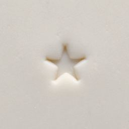 MKM Pottery Tools Mini Round Stamp - Texas Star applied to clay