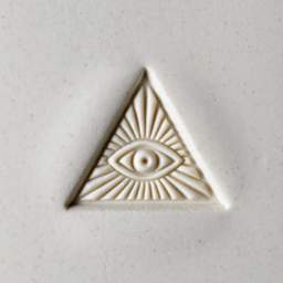 MKM Pottery Tools Large Round Stamp - SCL-016, Pyramid Eye applied to clay
