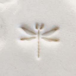 MKM Pottery Tools Small Round Stamp - SCS-149, Dragonfly applied to clay
