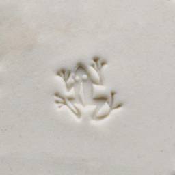 MKM Pottery Tools Small Round Stamp - SCS-156, Dancing Frog applied to clay