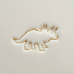 MKM Pottery Tools Large Round Stamp - SCL-165, Triceratops applied to clay