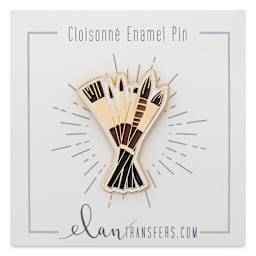 Elan Transfers Enamel Pin - Brushes pinned to front of packaging