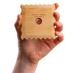 Garrity Tools Wood Texture Rib - Texture 7, in a hand
