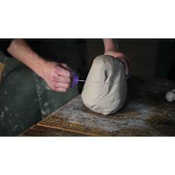 Mudtools Mudwires - Short Heavy, 11" Wire cutting into clay