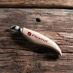 Flexcut Chip Carving Knife laying on wooden table