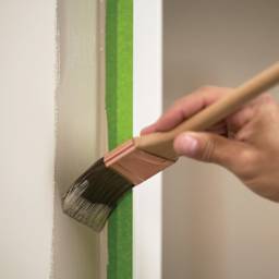 FrogTape Multi-Surface Painting Tape protecting wall trim from paint