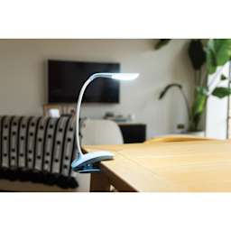 Daylight Smart Clip-On Lamp - Blue, attached to table