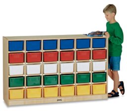 Jonti-Craft Mobile Storage Units - Child reading book next to 30-Tray Mobile Storage Unit