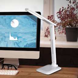 OttLite Slimline LED Desk Lamp - White, on a desk