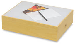 Light Box - Angled view with artwork, tracing paper, and pencil on acrylic top
