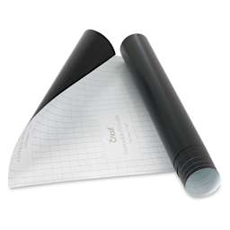 Cricut Removable Premium Vinyl - Black, 12" x 48" being unrolled