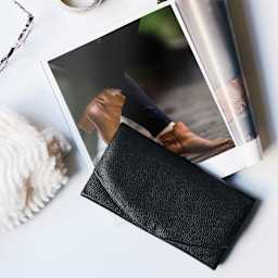 Realeather Deertan Leather Trim - Black, 11" x 8-1/2", on desk