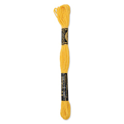 DMC Cotton Embroidery Floss - Medium Yellow, 8-3/4 yards showing back of packaging