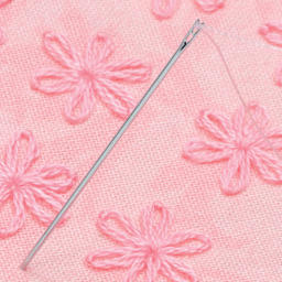 Dritz Easy Threading Hand Needles single needle in fabric