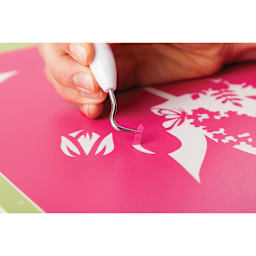 Cricut Weeding Tool Kit - Closeup of artist using Hook Weeder on pink vinyl 

