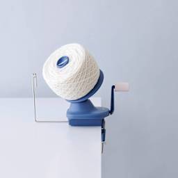 Clover Yarn Ball Winder - clamped to table with complete yarn spool