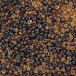 John Bead Czech Glass Seed Beads - Topaz, Luster Mix, 10/0, 22 g Vial close up