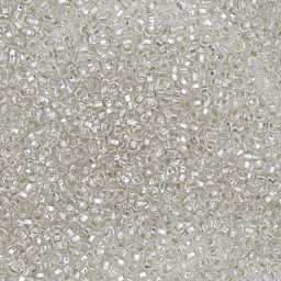 John Bead Czech Glass Seed Beads - Crystal, Silver Lined, 10/0, 22 g Vial close up