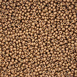 John Bead Czech Glass Seed Beads - Gold, 10/0, 22 g Vial close up