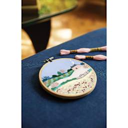 DMC The Designer Collection Embroidery Kits - “Spring Landscape” by Georgie K Emery, Advanced finished piece on table