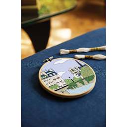 DMC The Designer Collection Embroidery Kits - “Paris” by Kseniia Guseva, Intermediate finished example on table
