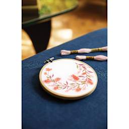 DMC The Designer Collection Embroidery Kits - “Country Party” by Pascaline Latasse, Intermediate finished example on a table