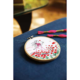 DMC The Designer Collection Embroidery Kits - “Romantic Poppies” by Nathalie Weinzaepflen, Beginner finished example on bed