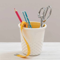 Dritz Ceramic Thimble Container - Yellow - in use on desk (items not included)
