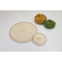 Skacel by Addi Shapes Basket Bases - Pkg of 2, Circle sitting beside yarn