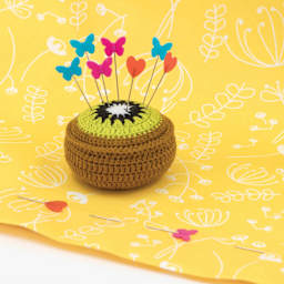 Prym Love Fruit Pin Cushion Pattern Weight - Kiwi 0.8 oz (Cushion with pins stuck into it)