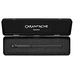 Caran d'Ache 849 Black Code Fountain Pen - Black, Fine Tip, shown inside of the metal case