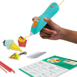 3Doodler Start+ Accessory Kit, person using the 3Doodler and accessory kit (Doodler pen not included)