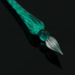 Herbin Round Glass Dip Pen - Turquoise close-up of nib against black background