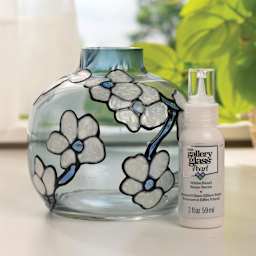Gallery Glass Paint bottle and decorated blue vase.