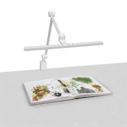 Artograph T-Bar Lamp with Table Clamp - White, on desk with artwork