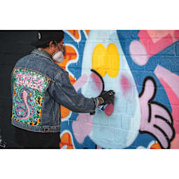 Montana Blue Water-Based Spray Paint in-use on a mural