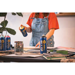 Montana Blue Water-Based Spray Paint in-use in an art studio