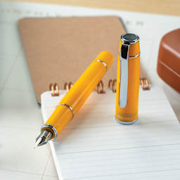 Pilot Prera Standard Fountain Pen - Honey Yellow, Fine, on notepad (not included)