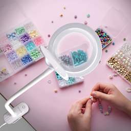 OttLite Lighted Magnifier Clip Lamp - in use with beads